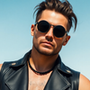 man with black leather vest no shirt wearing round steampunk sunglasses