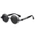 Nero Edge round steampunk metal sunglasses in jet black with double-blade accents and laser-cut detail