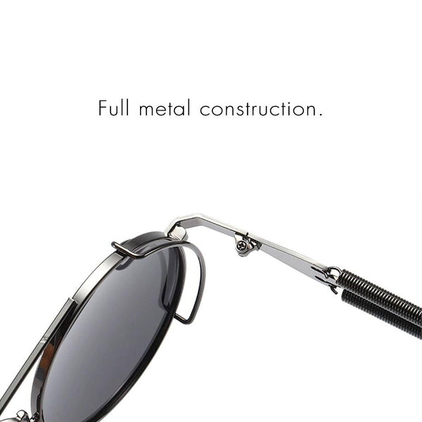 Close-up of vintage retro steampunk round eyewear gold sunglasses full metal construction